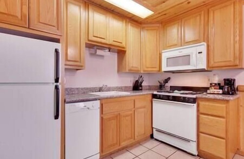 South Lake Tahoe House | This spacious 2 bedroom townhouse in South Lake Tahoe features a king bed