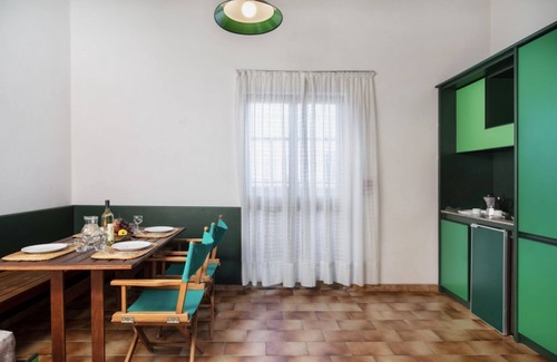 Teulada Apartment | Three-room apartment with sea view of approximately 62 m2 with air conditioning on the ground floor consisting of a large living room, kitchenette with electric hobs, fridge and TV.On the first floor we have two double or twin bedrooms with internal sink