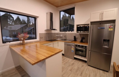 Ohakune House | Tiffany resort 3 quality homes plus heated pool and spa