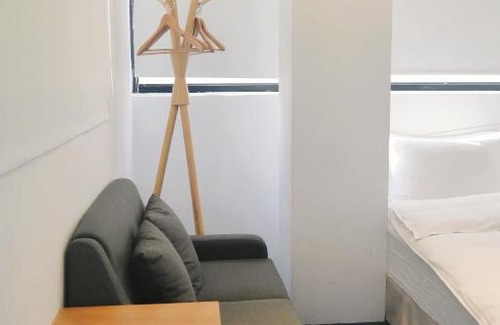 West District Hotel | Time Flyer Hotel