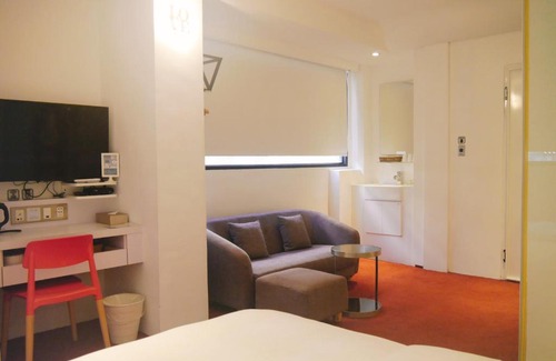 West District Hotel | Time Flyer Hotel