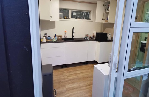 Tryphena House | Tiny Home only minutes from the pub, cafe and beach
