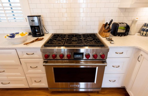 East Beach House | Tipsy Turtle delights with three floors of oceanfront luxury!