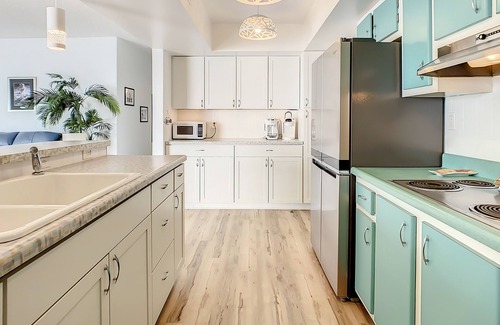 South Patrick Shores Condo | Top-floor, oceanfront condo with balcony