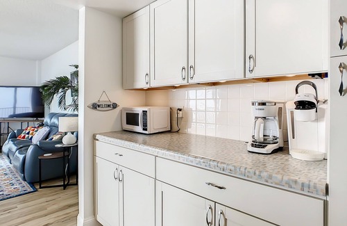 South Patrick Shores Condo | Top-floor, oceanfront condo with balcony