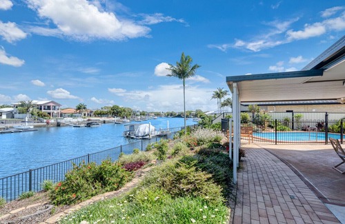 Banksia Beach Apartment | Topsail Tides Waterfront with Solar-Heated Pool and Canal Views