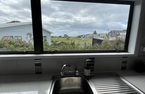 Waihi Beach House | Traditional North End Bach, next to the park and close to beach.