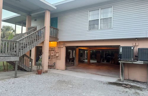 Laurel Apartment | Tranquil 3-bedroom apartment with wrap-around covered porch