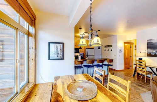 Whitefish Condo | Tranquil dog-friendly alpine retreat with fireplace & balcony - steps to slopes