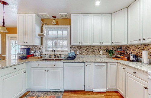 Piedmont House | Tranquil house with fireplace, hot tub, foosball table, jetted tub, & patio