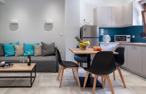 Almiros Beach Apartment | Tranquil Modern Apartments with Pool & Lush Garden close to the Beach and Resort