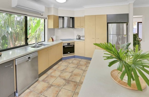 Palm Cove Villa | Tranquil Palm Cove Retreat with Heated Pool, Lush Gardens & Steps to the Beach