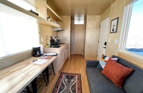 Pear Park House | Tranquil Tiny House Hideaway in Colorado: Peaceful Waterside Bliss in Grand Junction