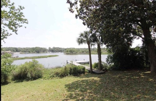 East Hill Condo | Tranquility on the Water...Close to Beaches and Downtown