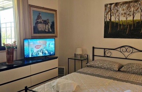Caltagirone Apartment | Tre Palmi, minicasa con ampia veranda, giardino, parcheggio e bbq