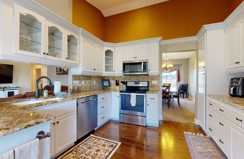 Sisters House | Tree-lined retreat with a hot tub, grill, game room, & W/D - mountain views