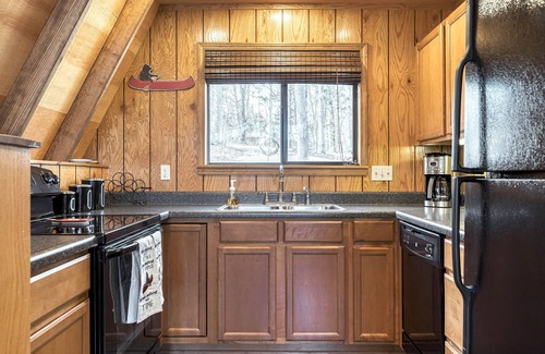 Wright City Ski Chalet | Treehouse Lodge by Sarah Bernard, a Woodland Retreat with Solo Stove Firepit