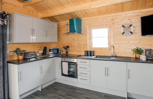 Rhosneigr Cabin | TREM Y MOR LODGE, pet friendly, country holiday cottage in Rhosneigr
