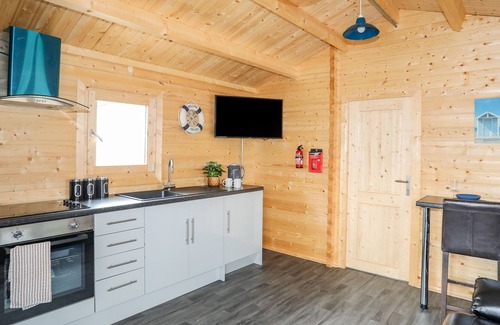 Rhosneigr Cabin | TREM Y MOR LODGE, pet friendly, country holiday cottage in Rhosneigr