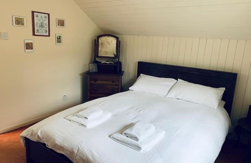 Godmanstone House | Trinity Annexe an adorable first floor light and lofty space within an AONB