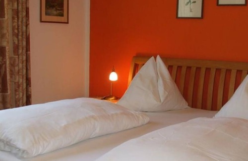 Ossiach Bed & Breakfast | Triple room with balcony and lake view - Hotel-Pension Brönimann