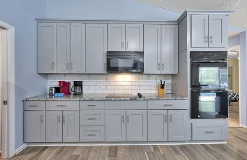 Palm Coast House | Tropical Escape – Heated Pool & Palm Breezes