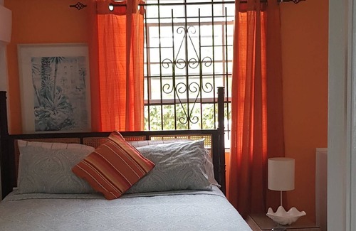 Dennery Apartment | Tropical spanish style suite with a fantastic mountain view