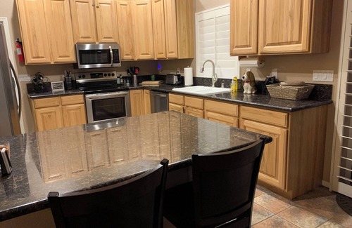 Bullhead City House | Tropical Sunridge Estates Large Family Pool Retreat-6 minutes to Lake Mohave!