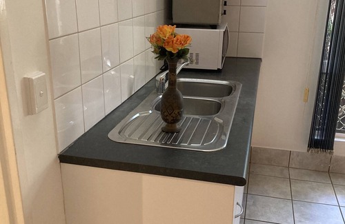 Tiwi Apartment | Tropical Treat -large Studio Bedroom Studio Plus With Huge Outdoor Patio