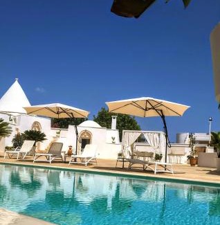 San Michele Salentino House | Trullo il Gelso with Private Salt Water Infinity Pool and Jacuzzi inside