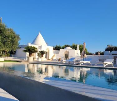 San Michele Salentino House | Trullo il Gelso with Private Salt Water Infinity Pool and Jacuzzi inside