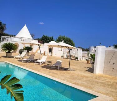 San Michele Salentino House | Trullo il Gelso with Private Salt Water Infinity Pool and Jacuzzi inside