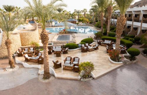 Ras Umm Sid Resort | Turquoise Beach Hotel