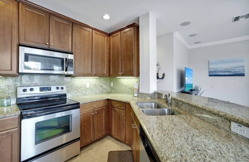 Naples Condo | TWO BEDROOM 2 BATH 2ND FLOOR END UNIT IN ARTESIA-NAPLES