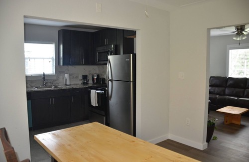 Northside House | Two bedroom, one bath, modern bungalow with full kitchen and outdoor dining.