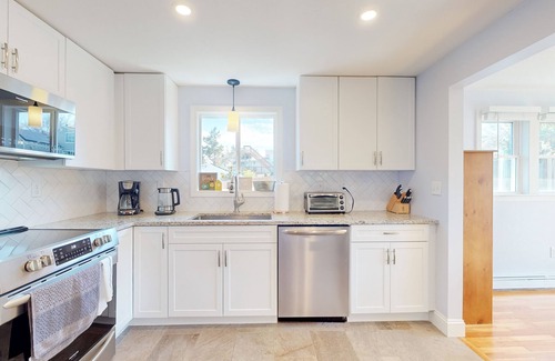 Manomet House | Two-story home near the beach with spacious deck, grill, modern kitchen, & W/D