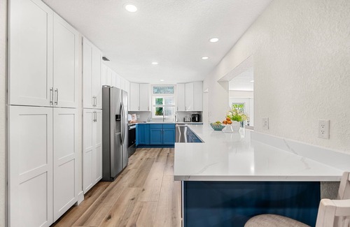 Seacoast Shores House | Ultimate Beach Oasis: Heated Pool, Game Room, BBQ & Pet-Friendly 🏖️