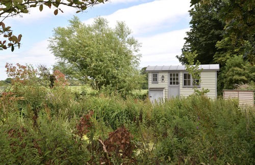 East Ashling House | Unique, tranquil retreat in fabulous grounds with own garden & pond. Nr Goodwood