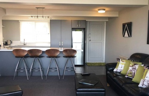 Two Mile Bay Apartment | Unit 16 · Luxury by the lake