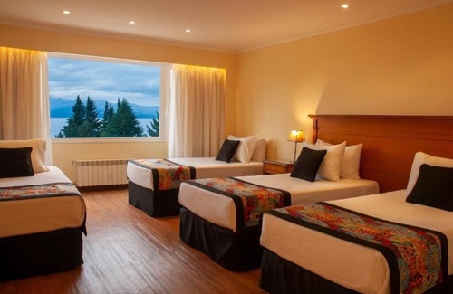 San Carlos de Bariloche Hotel | Unwind in a Spacious Room with Panoramic Nahuel Huapi Views – Ideal Location