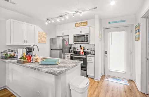 Little River Condo | Updated condo with on-site pool, tennis AC, & W/D - near golf/beach