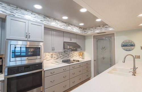 Ormond-by-the-Sea Condo | Updated direct oceanfront corner condo with private balcony, heated pool and garage