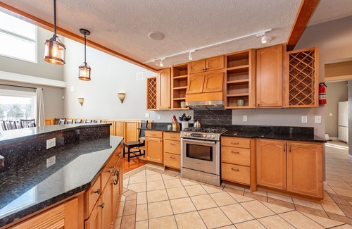 Waterfront Greens House | Updated Lakefront Retreat w/Pool Table & Hot Tub