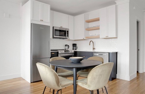 North Brookline Apartment | Upscale Brookline 1BR w/W/D, steps to Green Line, by Blueground