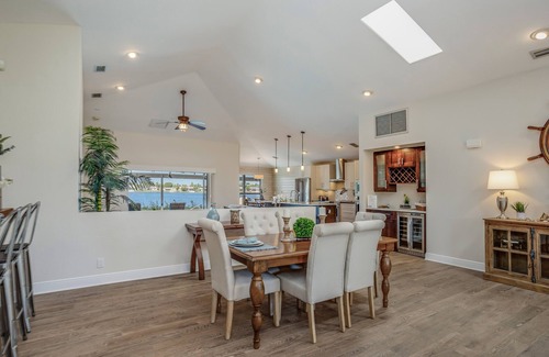 Eight Lakes House | Upscale lakefront home w/private saltwater pool, dock, free WiFi, & central AC