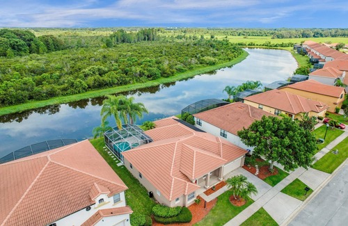 Buena Ventura Lakes House | Upstay - Waterside Home With Pool and Hot Tub
