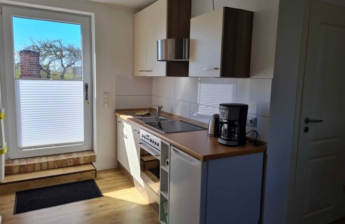 Meschendorf Apartment | Vacation apartment "Baltic Sea in view" 50m walk to the beach and sea view
