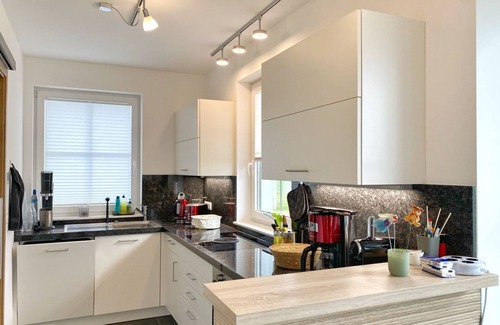 Dranske House | Vacation home "Distelfink" in Dranske/Lancken - thatched roof house with Bodden view,