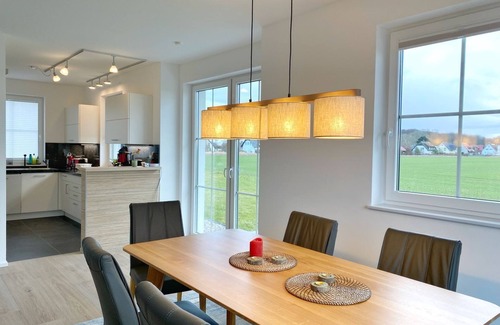 Dranske House | Vacation home "Distelfink" in Dranske/Lancken - thatched roof house with Bodden view,