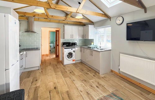 New Romney Cottage | Very spacious property across the road from a lovely golden sanded beach.